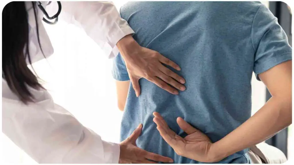 a doctor examining the back of a person